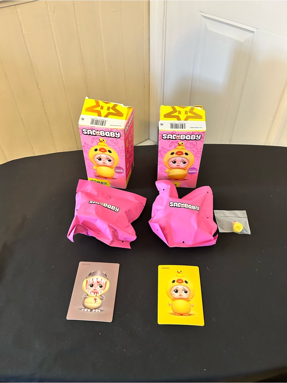 Two SadBaby Animals Series 1 Duck & Dinosaur Collectibles With Character Cards